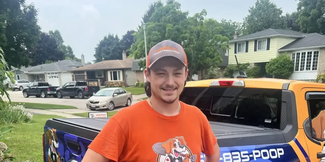 The Poop Valet technician completing a professional yard cleanup