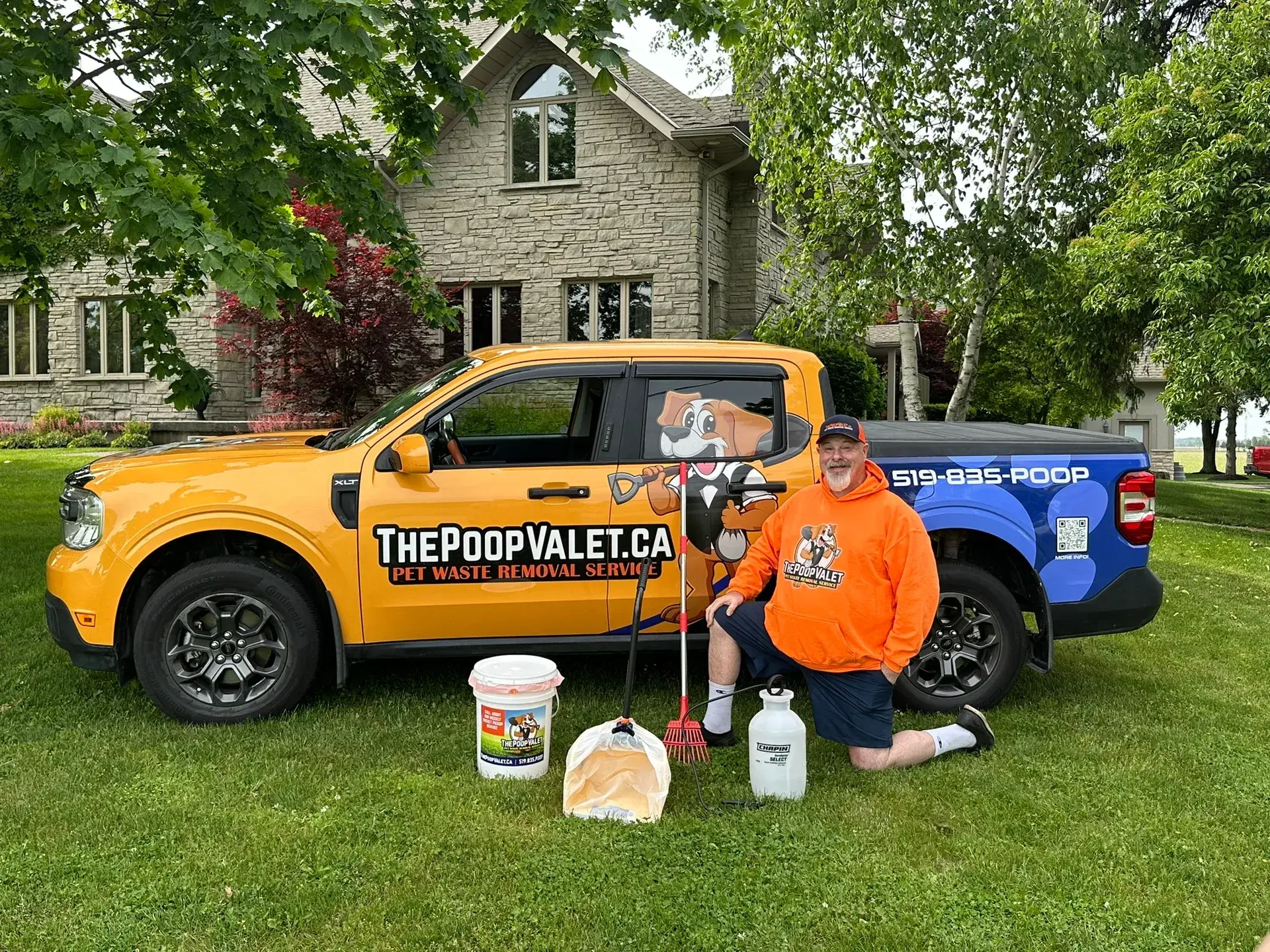 The Poop Valet technician preparing a one-time yard cleanup